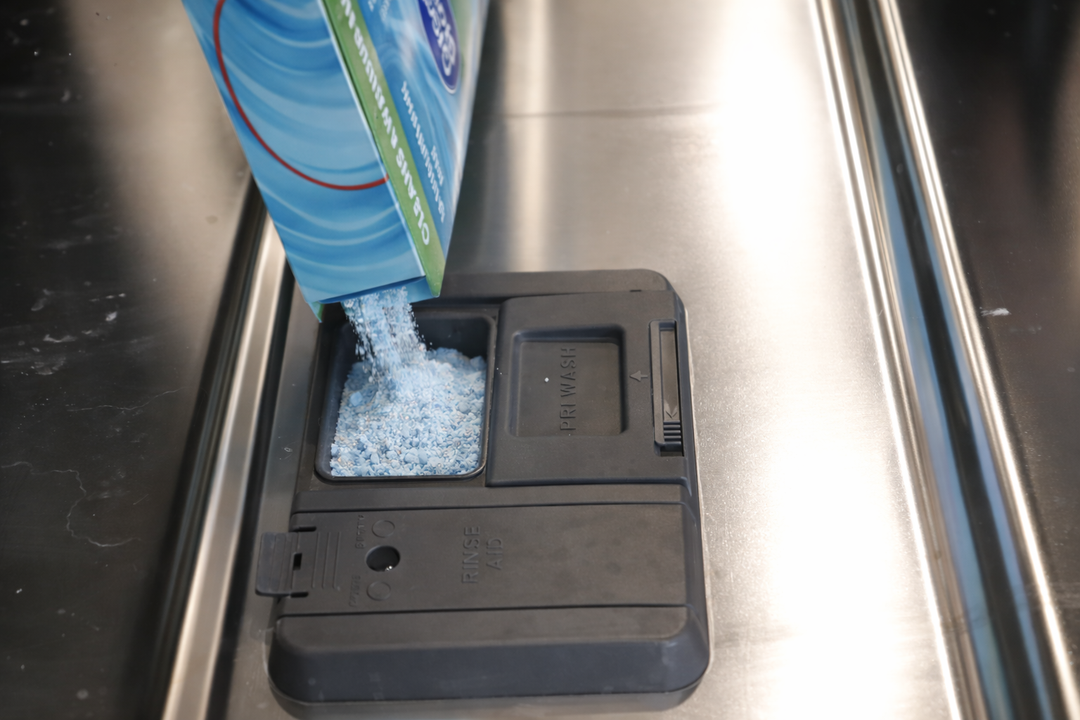 Detergent to the dishwasher