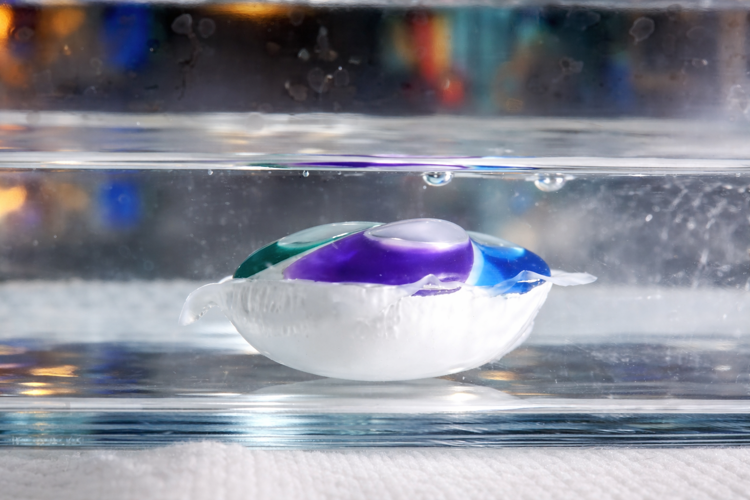 Dishwasher pod floating in water